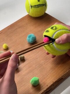 fine motor strengthening tennis ball