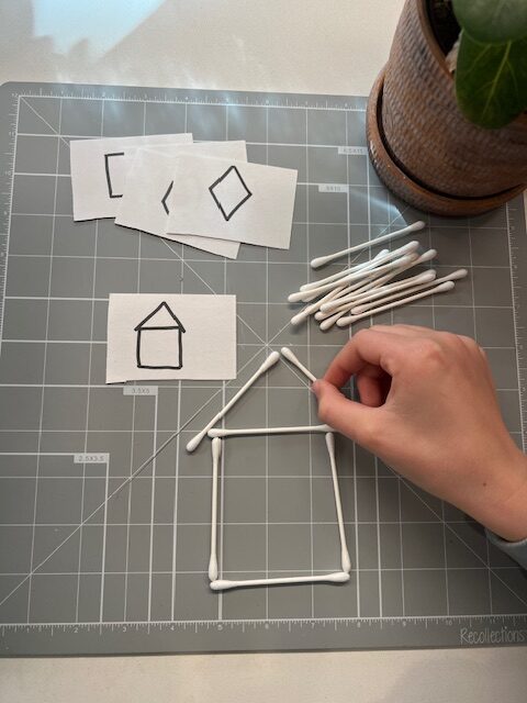 Copy a picture using Q-tips to develop visual discrimination and fine motor coordination in children.