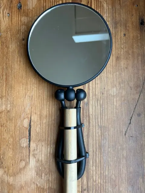 DIY long handled mirror for diabetes skin checks.