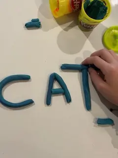 boost handwriting skills in kids- playdough letters
