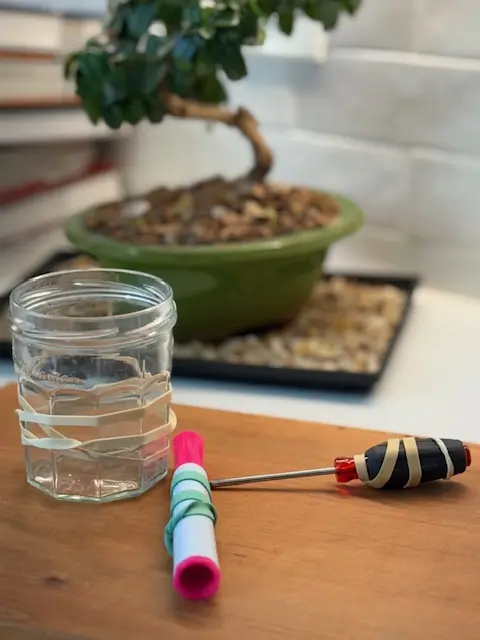 DIY assistive tech using rubber bands to enhance grip